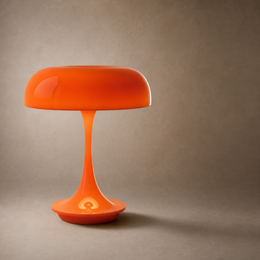 A modern mushroom-shaped table lamp in a vibrant orange color, featuring a smooth dome-shaped shade and a curved stem base, set against a textured warm gray background.