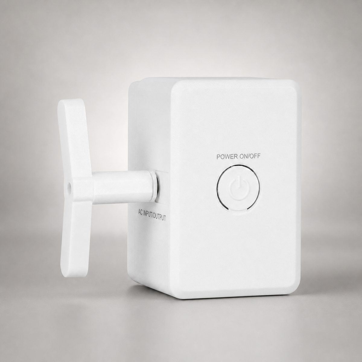 A white AC adapter with a T-shaped handle on the left side and a power switch button on the front face, set against a neutral gray background.