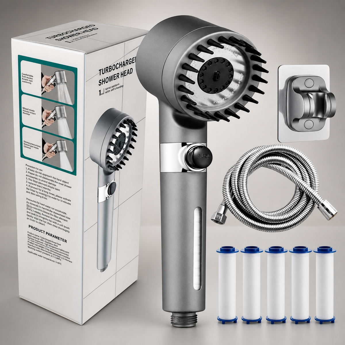 A turbocharged shower head set shown with its retail box, wall mount, flexible metal hose, and five filter cartridges on a neutral studio background.