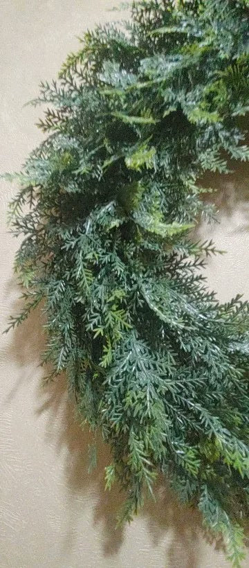 Close-up of the faux cypress garland's layered fronds (supplier photo)