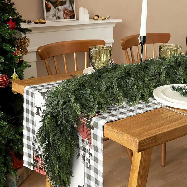 Faux cypress garland used as a table runner (supplier photo)