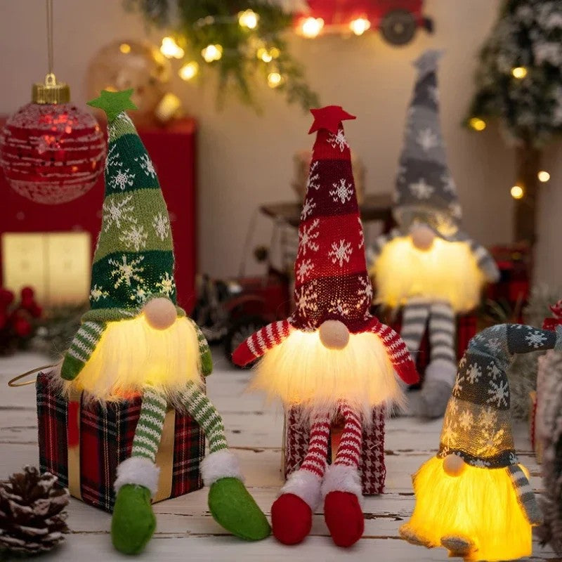 Red, green and grey Long Legs gnomes glowing side by side