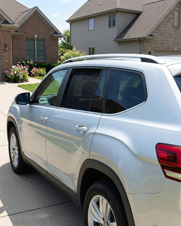 Parked SUV with Scudo shades mounted inside the glass