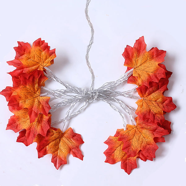 One maple leaf strand with the lights off, bundled, 10 leaves